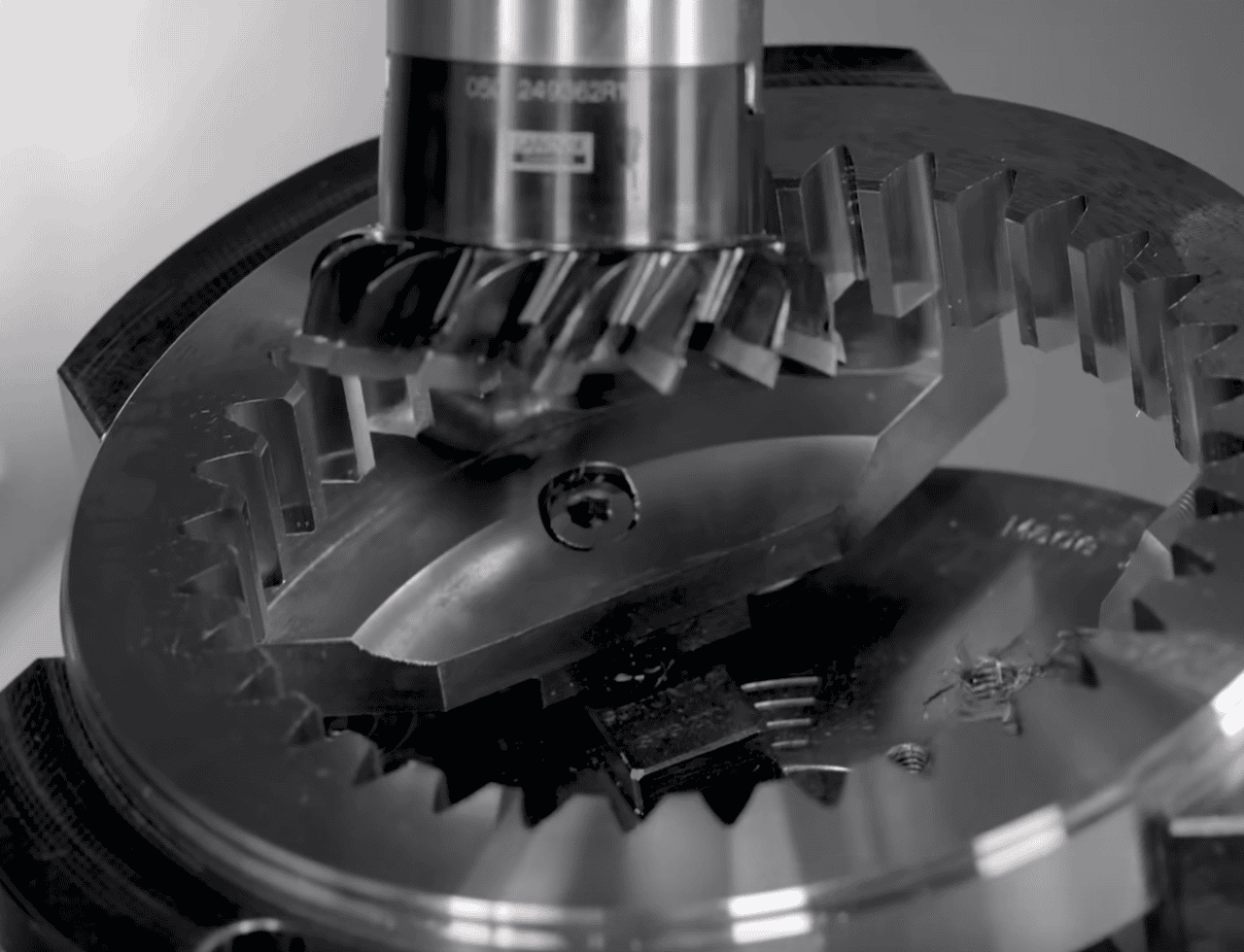 Nobeve precision gear hob undergoing a CNC tool grinding process with oil cooling to ensure strict profile tolerances