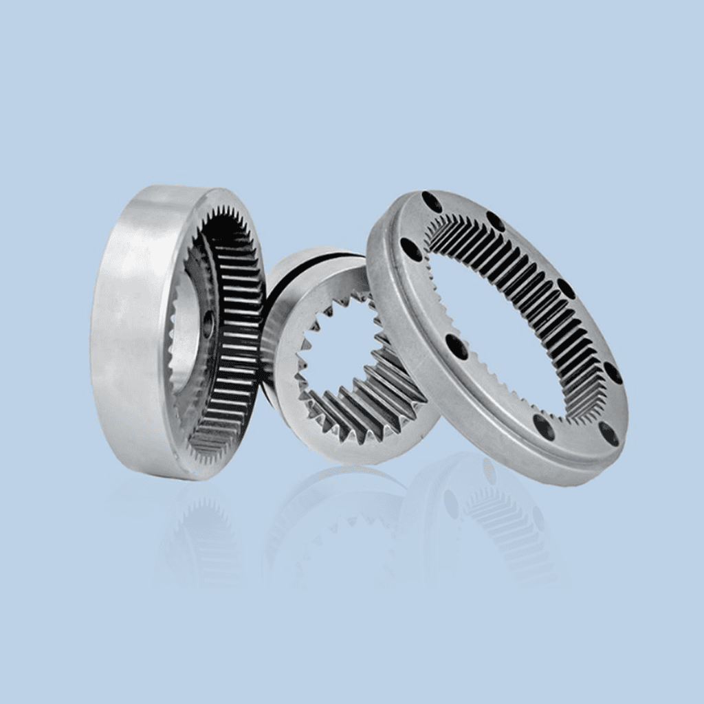 Three precision micro internal ring gears for surgical robot joints, machined using Nobeve W-Series solid carbide skiving cutters