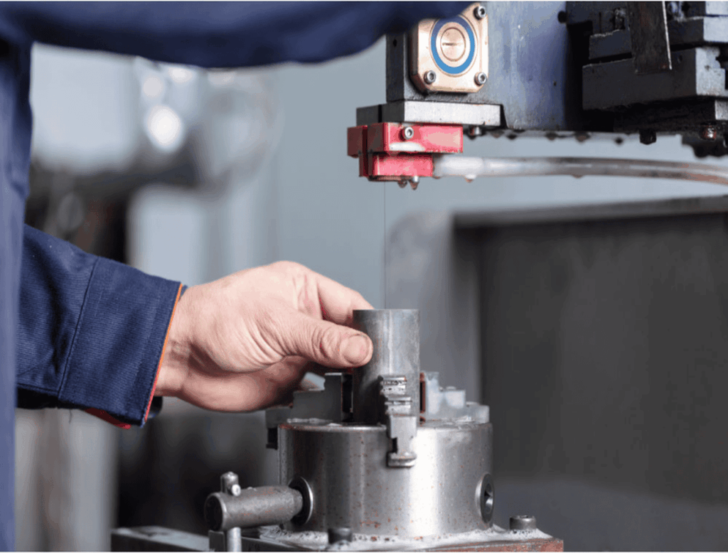 Close-up view of a Nobeve solid carbide gear hob engaging with a gear workpiece during a continuous generation machining process