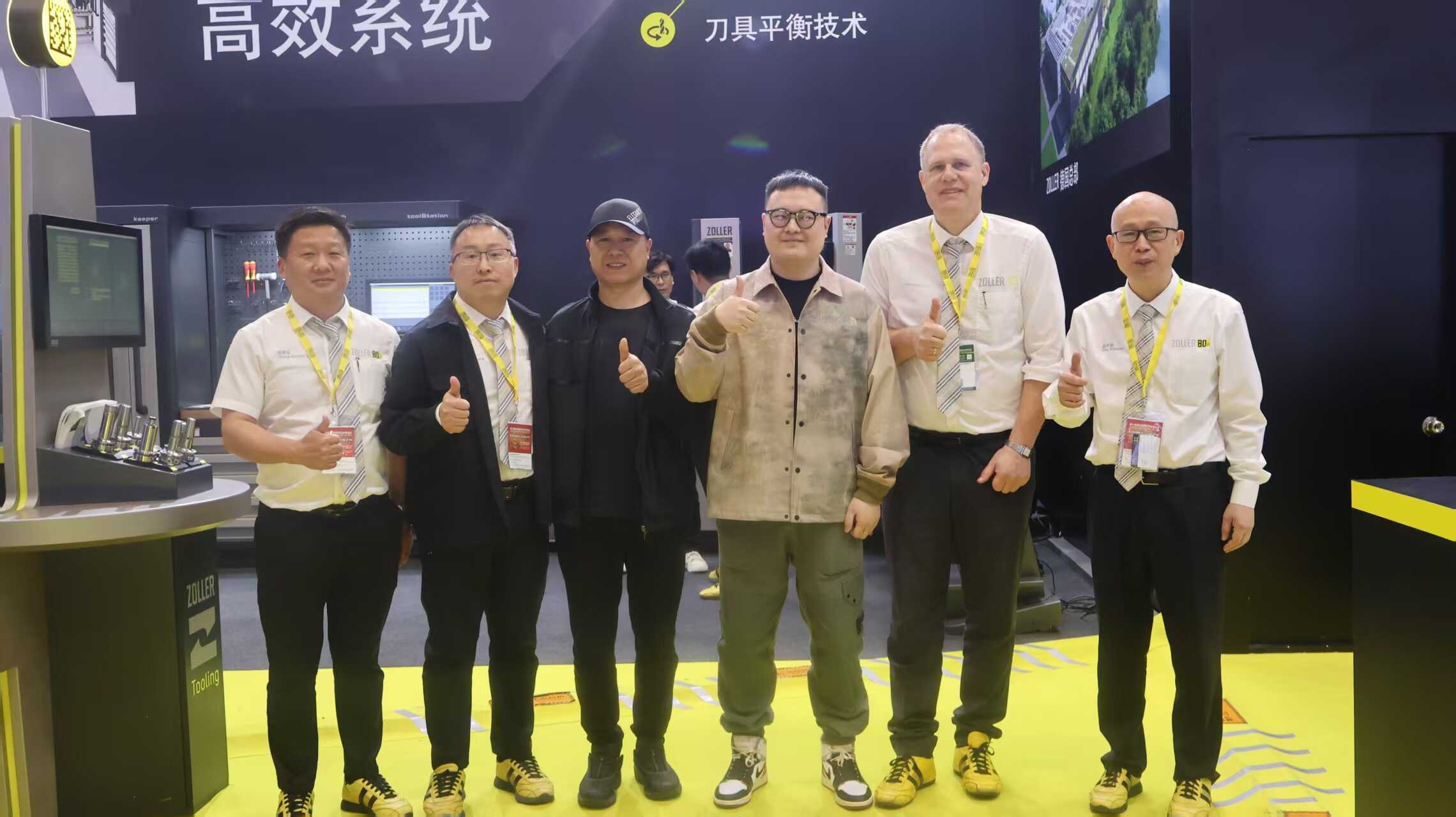 Nobeve professional technical team showcasing small modulus gear cutting expertise at an international machinery exhibition